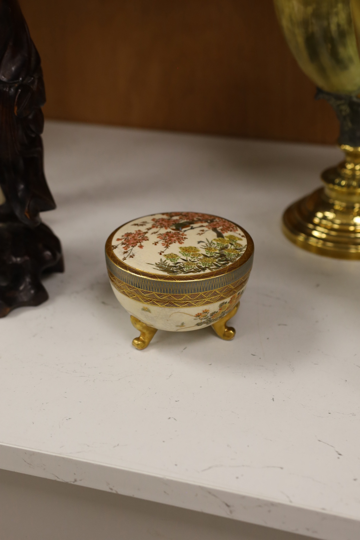 A late 19th century Japanese Satsuma ‘hundred antiques’ gosu blue pot pourri vase and three later items of Satsuma, including a bowl and cover a bowl on stand, a box and cover, tallest 18.5cm high. Condition - vase cover